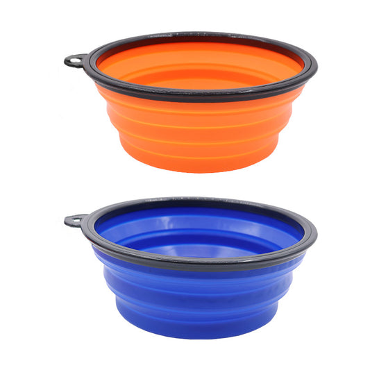 Collapsible silicone pet travel bowl in orange and blue